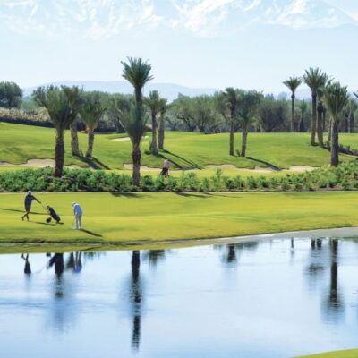 Fairmont Royal Palm Golf & Coutry Club Marrakech. With the foothills of the snowy Atlas Mountains in the background, the 18-hole golf course, designed by Cabell Robinson, covers 75 hectares of exquisitely landscaped ground. Design by Cabell B. Robinson.